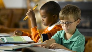 Elementary students studying