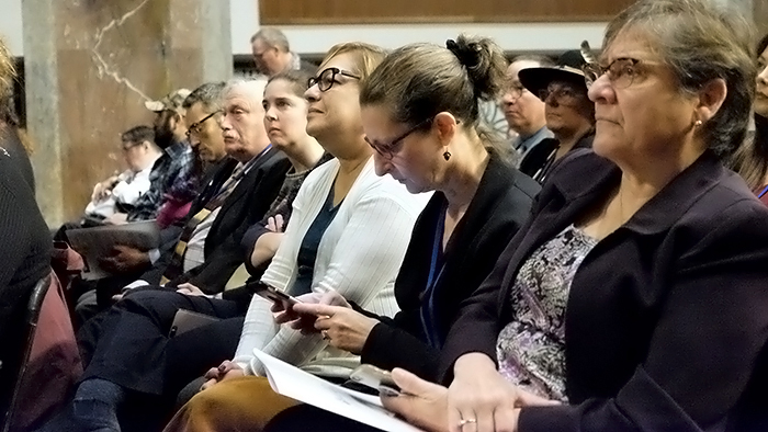 Audience listenting to closing plenary session at AUCD 2019 conference.